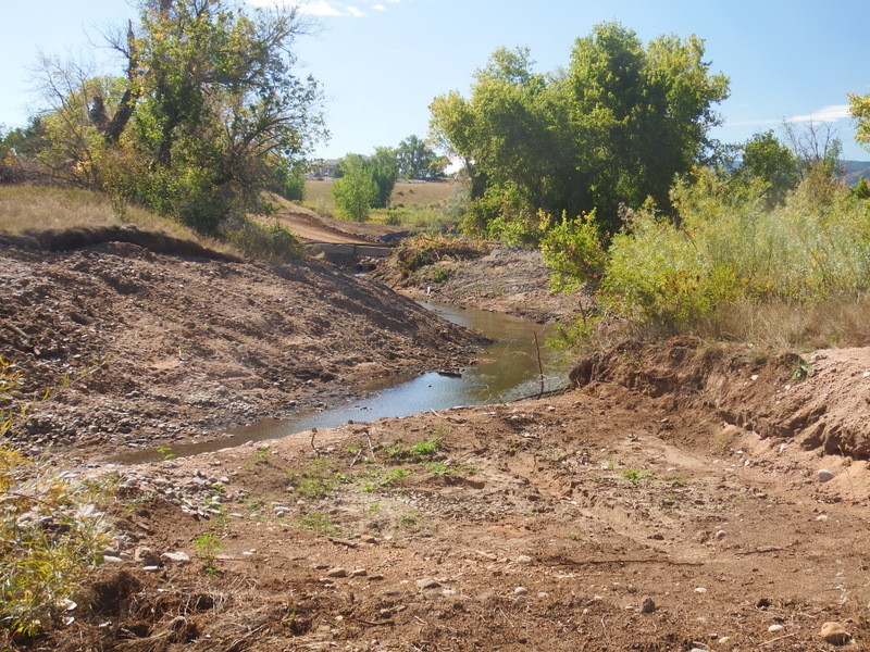 Creek with bulldozed banks 